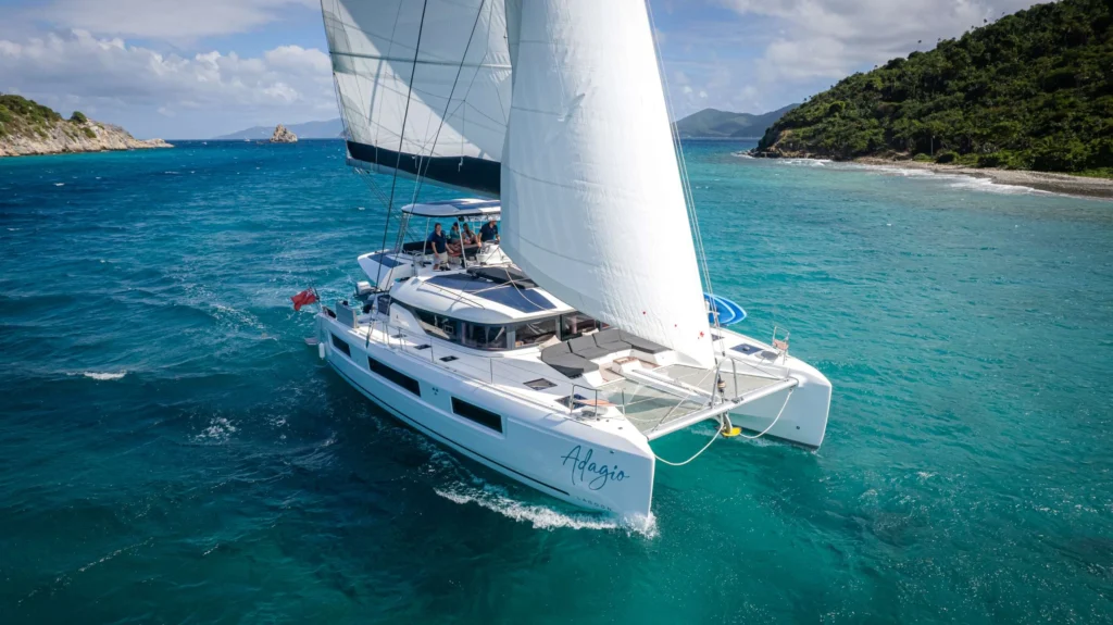 Catamarans sailing on ocean between islands