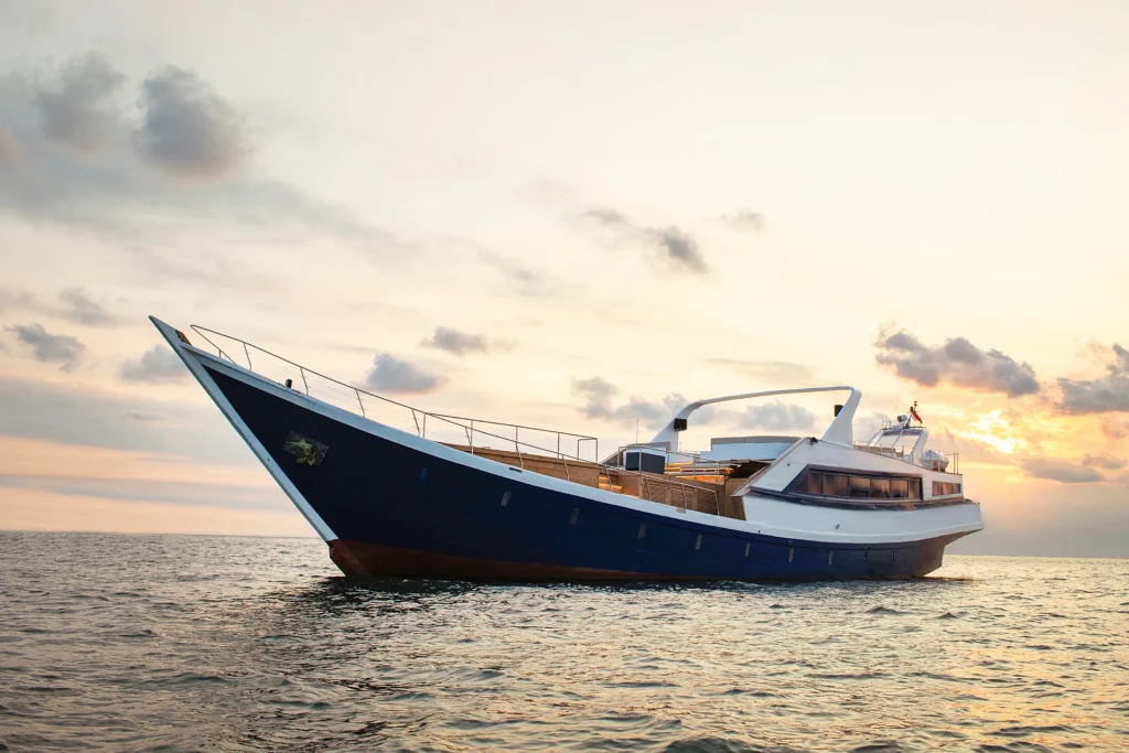 Shivanna phinisi style yacht in the sunset